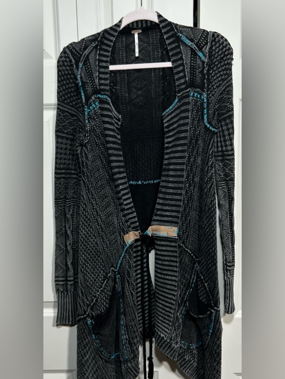 Free People Black Open-Front Long Knit Cardigan Sweater with Teal Accents.